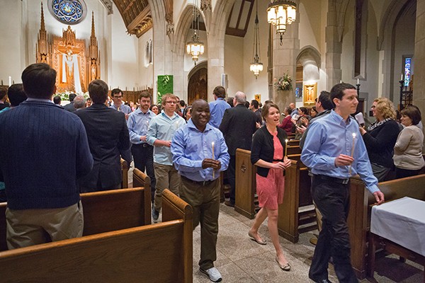 People participating in mass