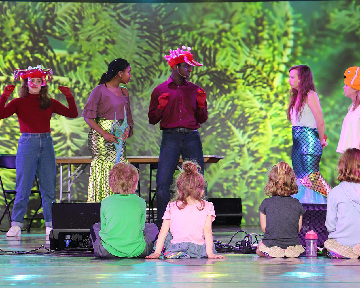 A theatre group performing Little Mermaid