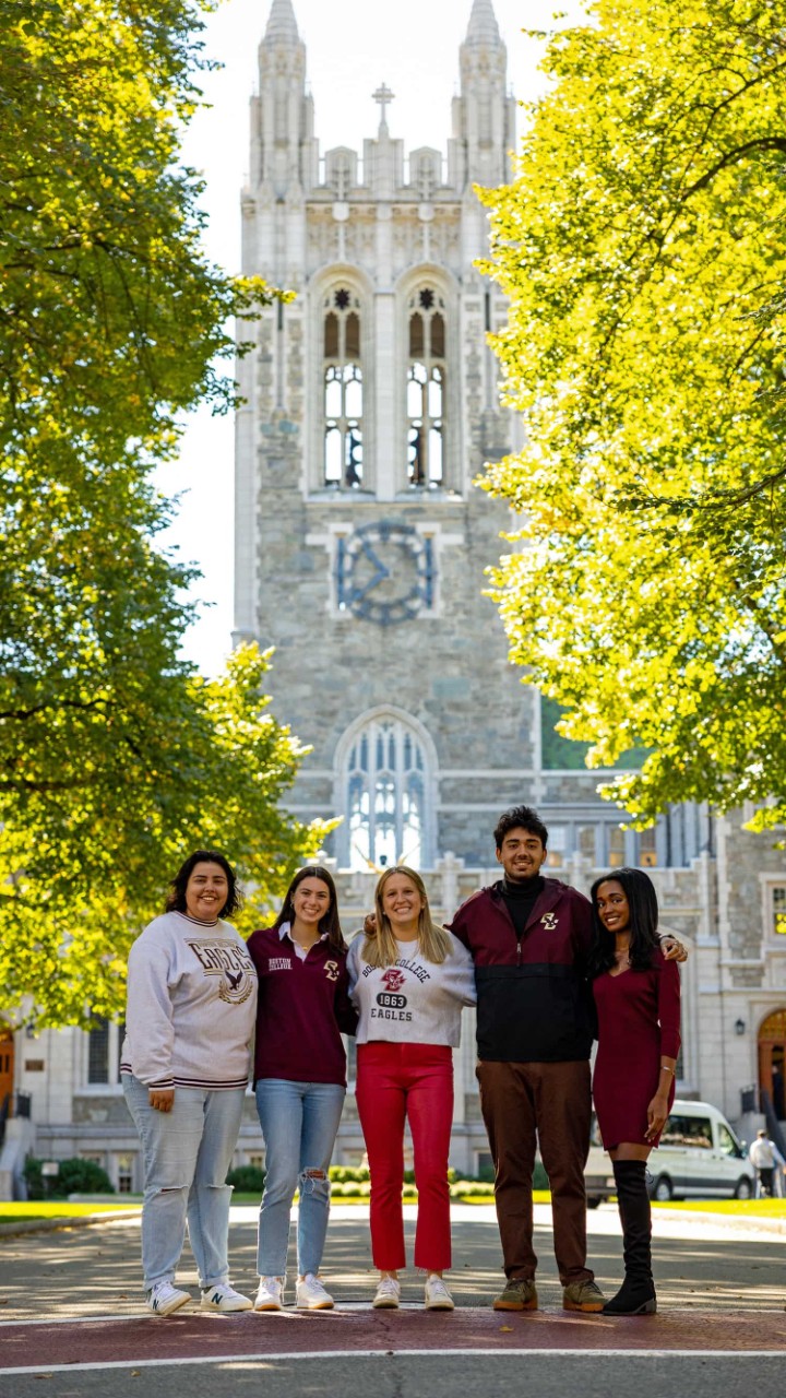 Five students in front of Gasson Hall