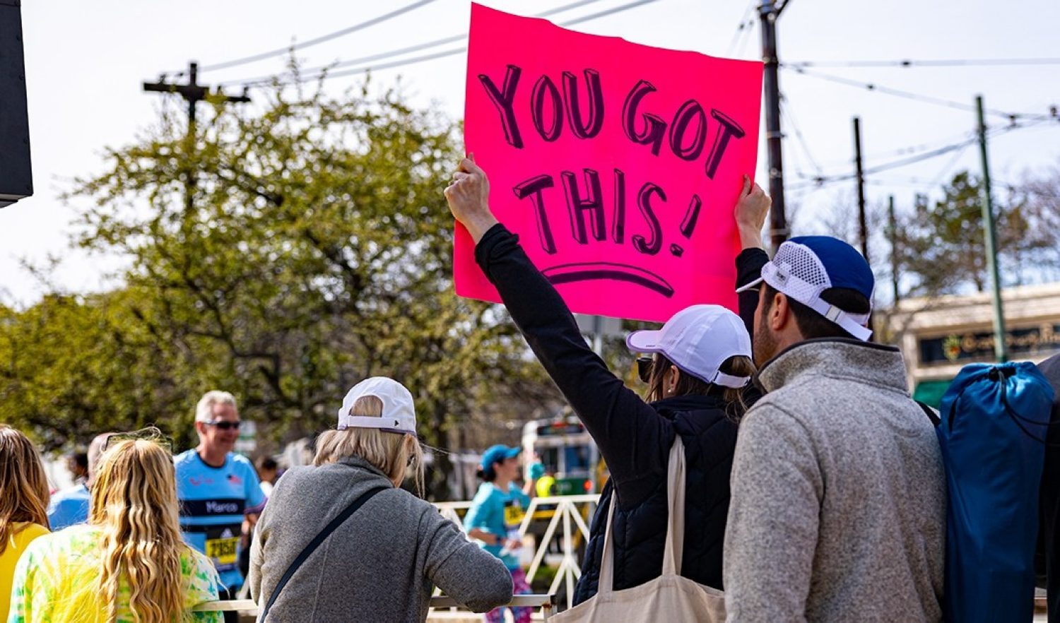 Spectators cheering at the Boston Marathon