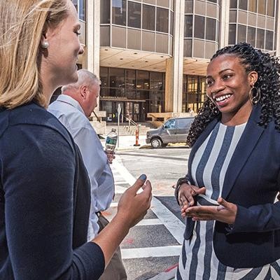 Photo of BC student connecting with alum