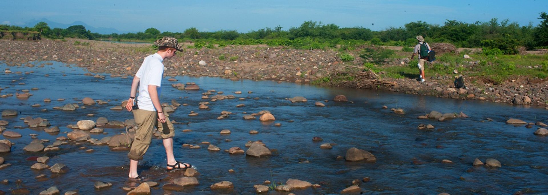 Students conducting research in a local river