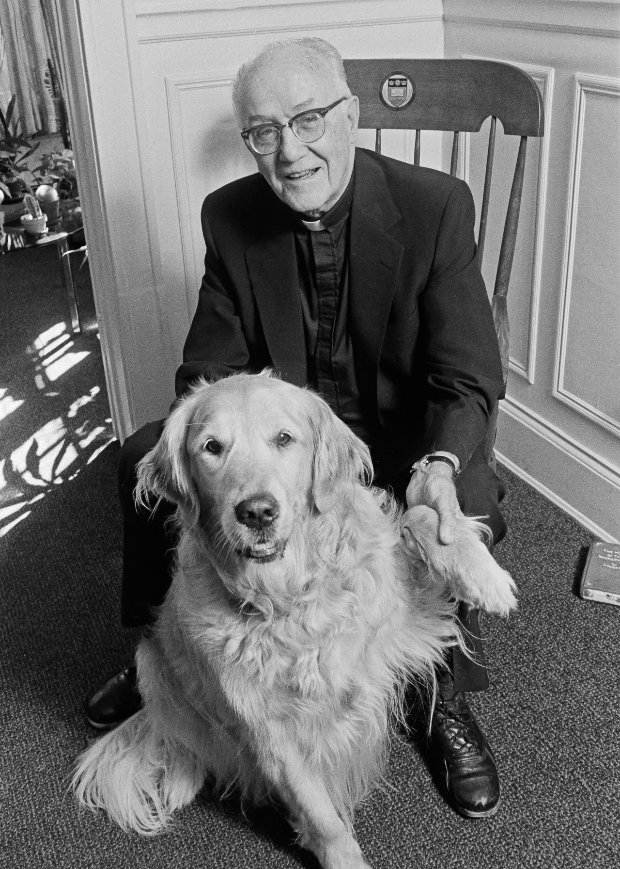 "Echoes of a University Presidency: Selected Speeces" by J. Donald Monan, SJ. Published in 2008 by Linden Lane Press.

Page 95.

Academic vice president Charles F. Donovan, SJ, with Brandy.