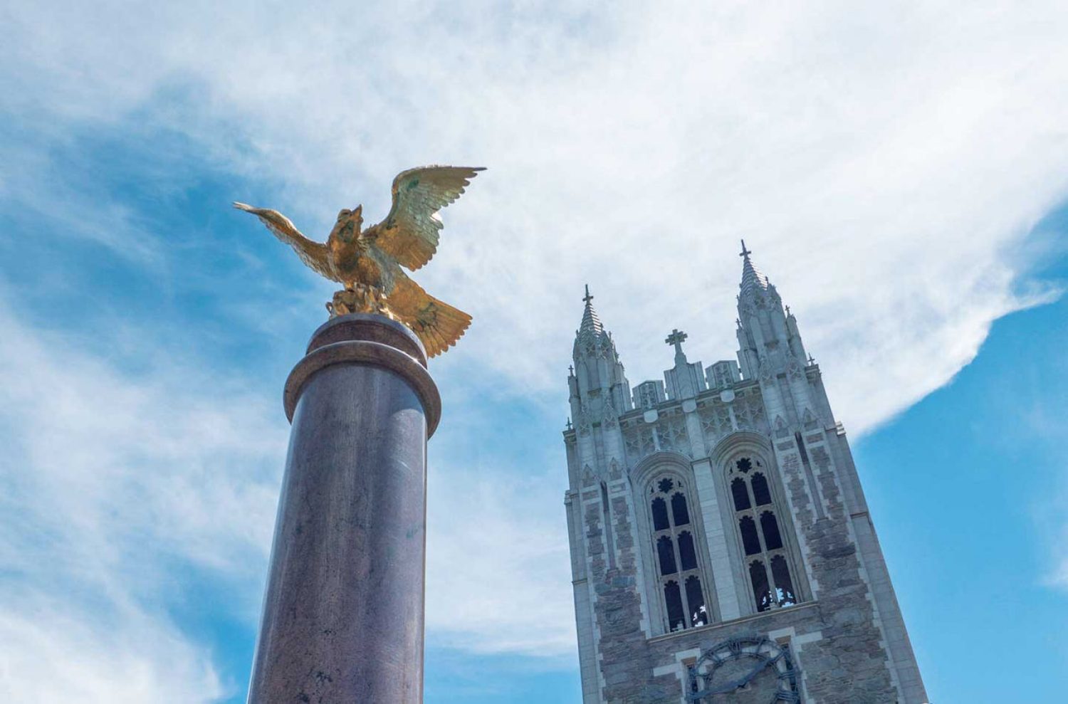 Photo looking up at the eagle and Gasson Hall