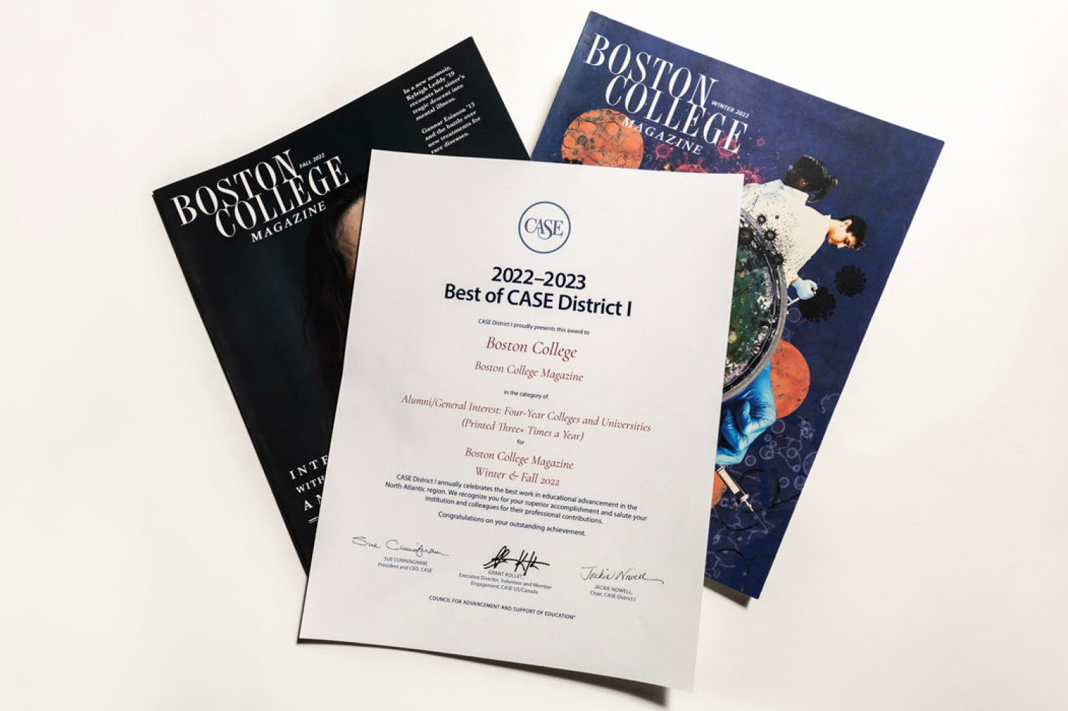 covers of two magazines and an awards certificate