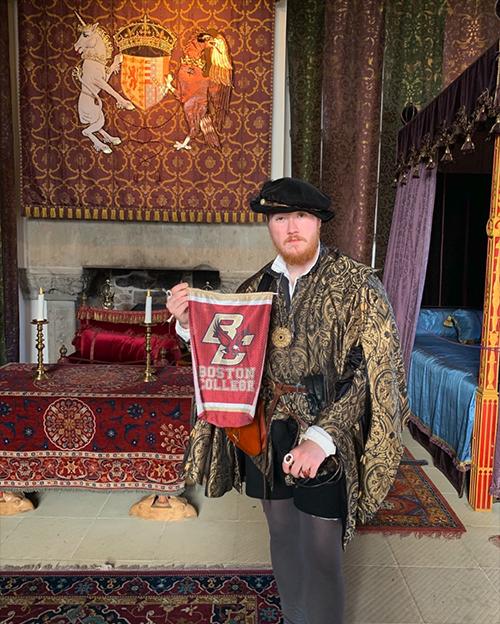 A nobleman holding a BC banner