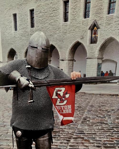 Medieval knight holding a BC banner
