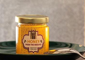 A jar of honey with the label "Honey from the Heights"