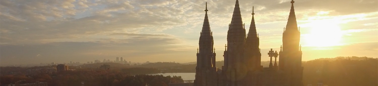 The city of Boston at sunset, as viewed from the top of Gasson Hall on BC's campus.