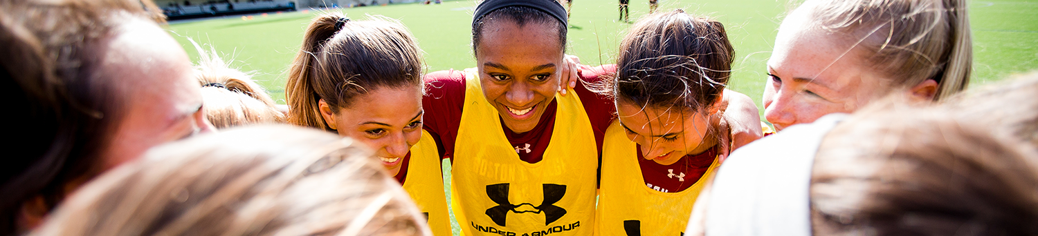 student athletes huddle